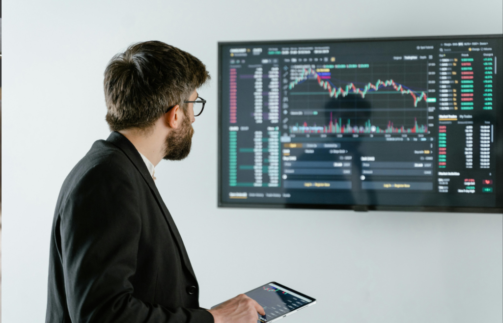 A marketing strategist reviewing analytics on a tablet