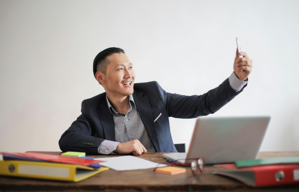 A person in a corporate office and taking picture