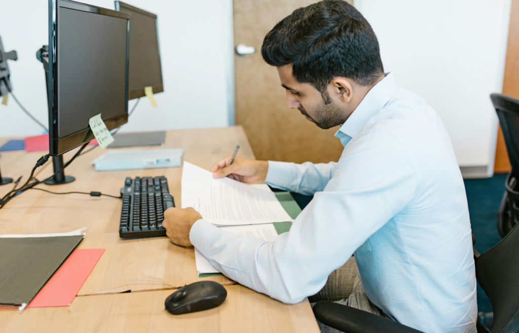 A hardworking employee busy in office