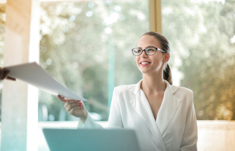 An employee looking at a stable paycheck