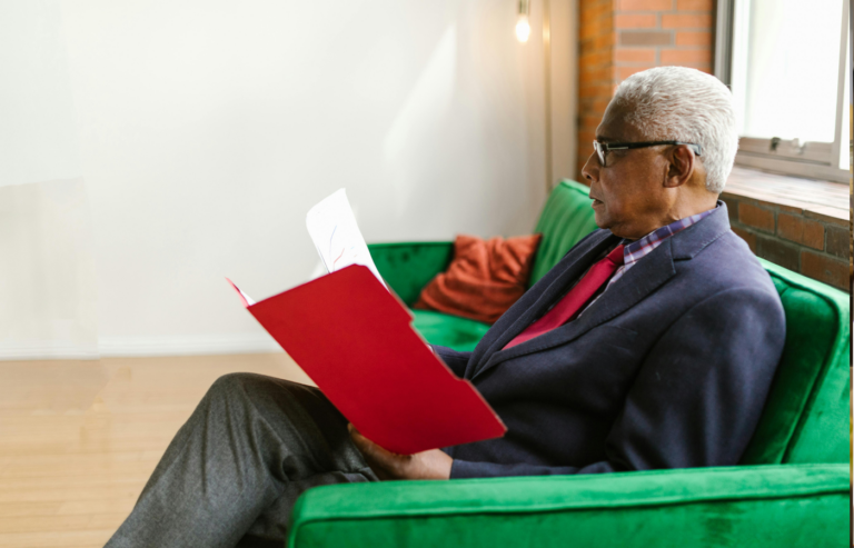 A person looking lost while flipping through old work emails