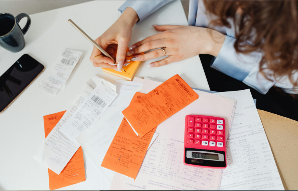A person calculating a tax bill.