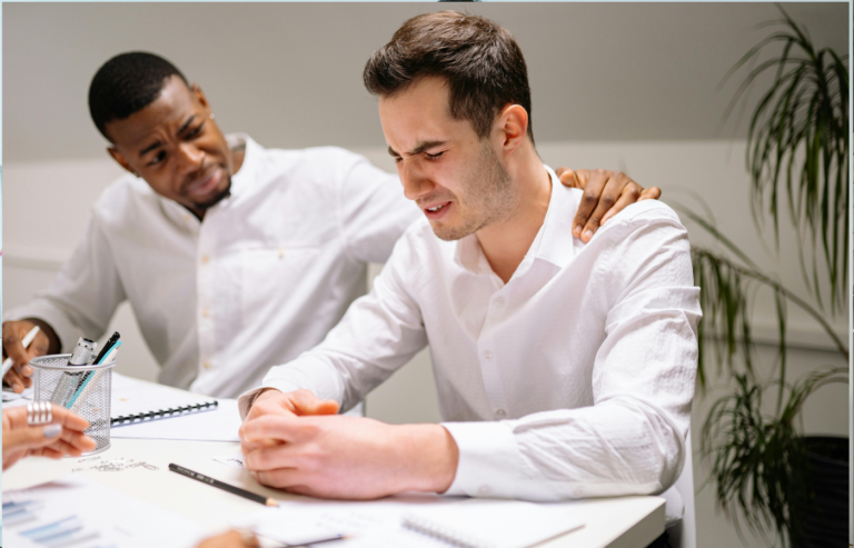 An employee nervously explaining personal expenses to a manager