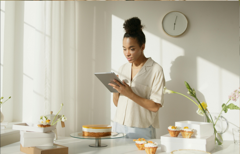 woman in White Shirt Using Silver Ipad