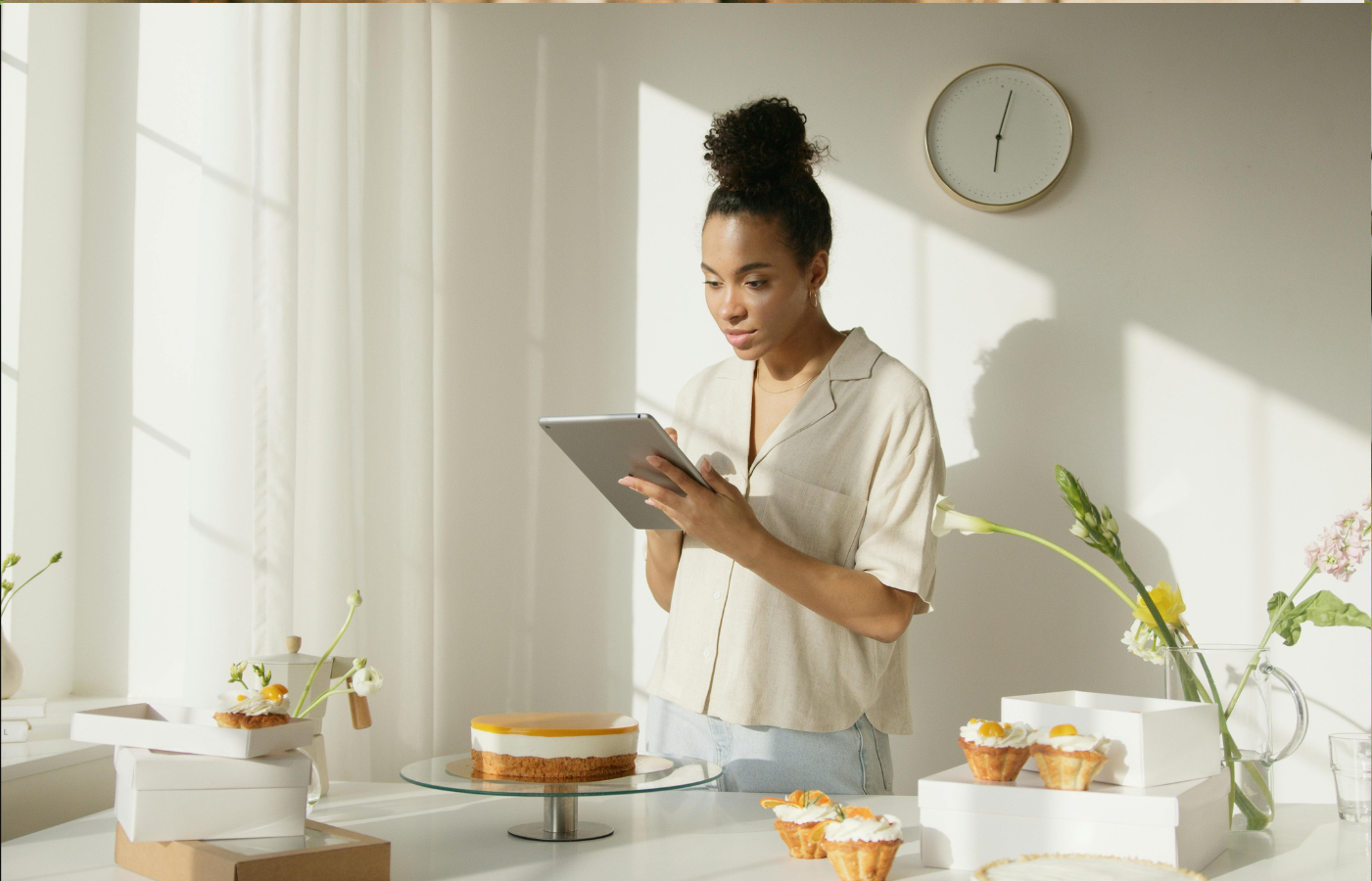 woman in White Shirt Using Silver Ipad