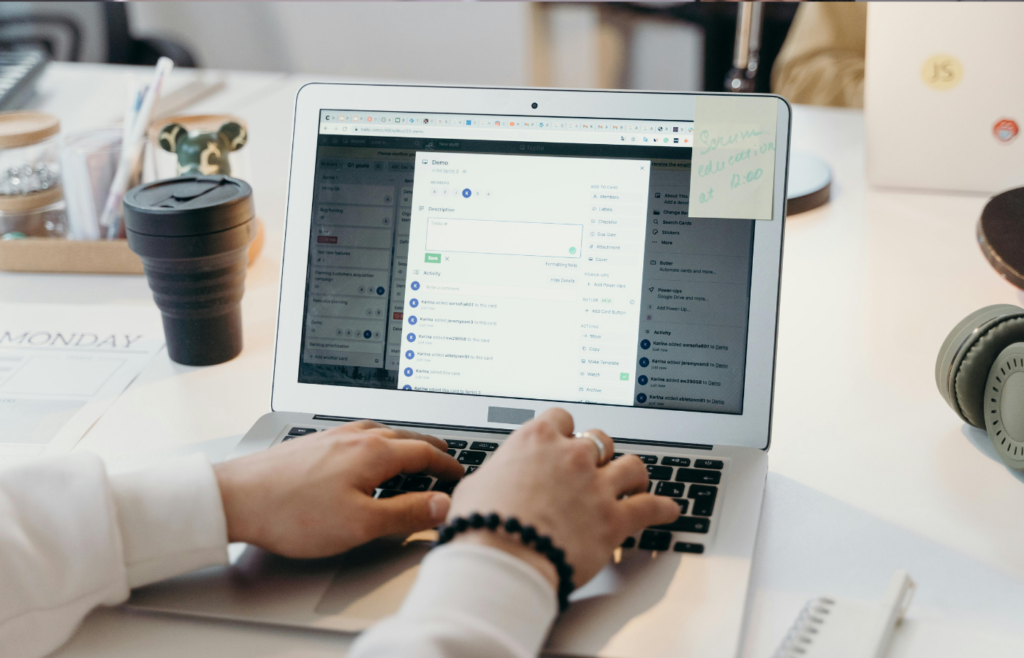 A man quickly skimming an email with a salary request before deleting it.