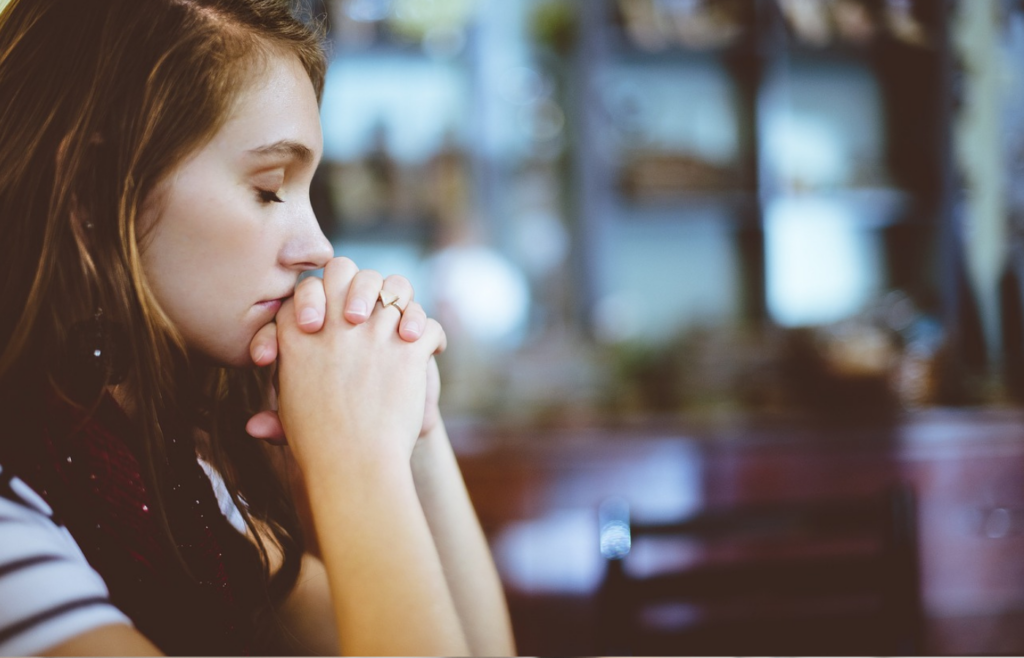 A hopeful woman waiting for Boss to Bring It Up