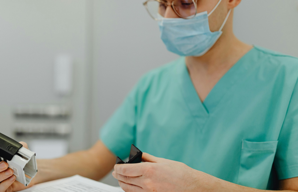 A healthcare person reviewing reports in a hospital office