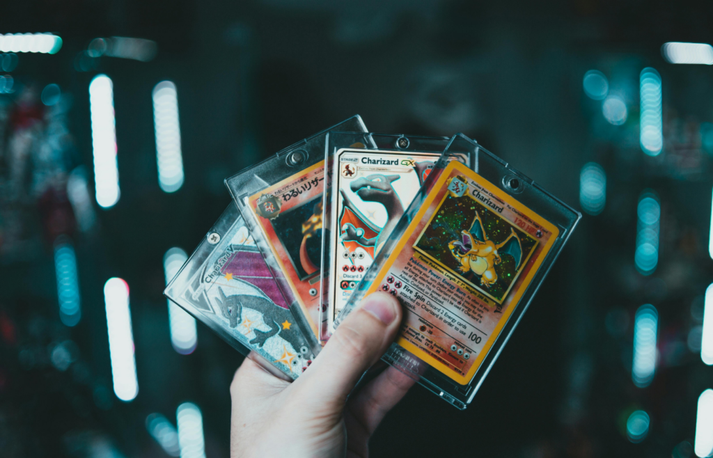 A collection of graded Pokémon cards in protective cases.