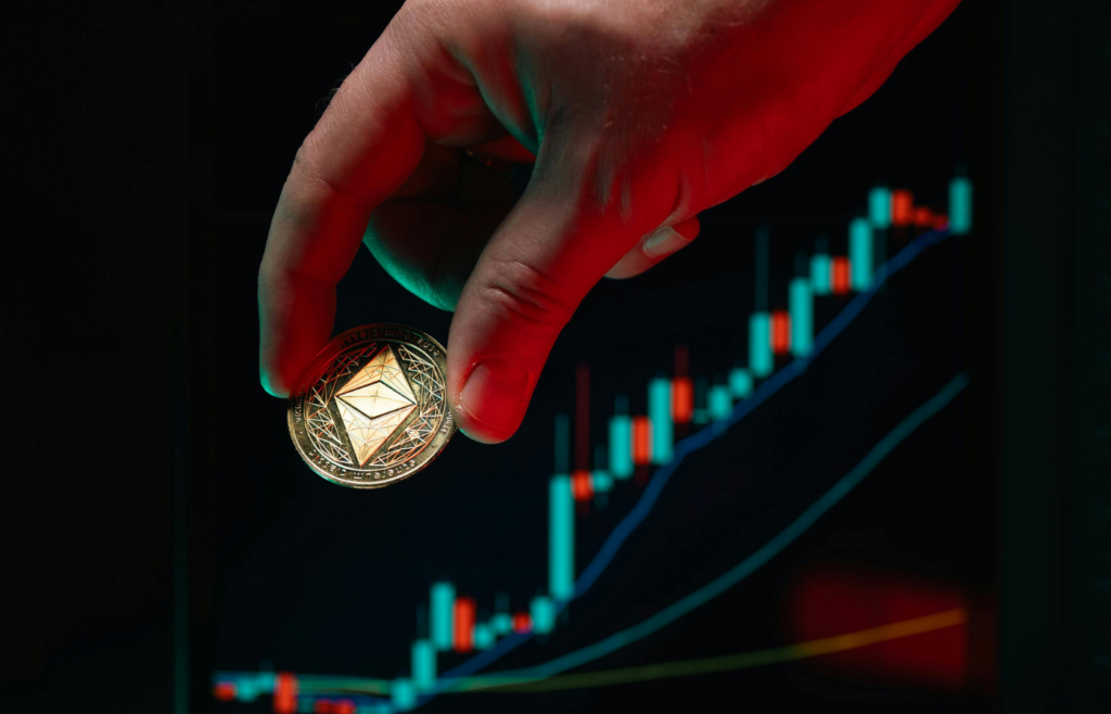 A digital Ethereum coin glowing against a dark background.