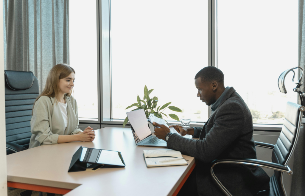 A hiring manager listening attentively to a candidate