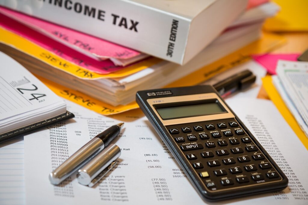 tax documents with a calculator