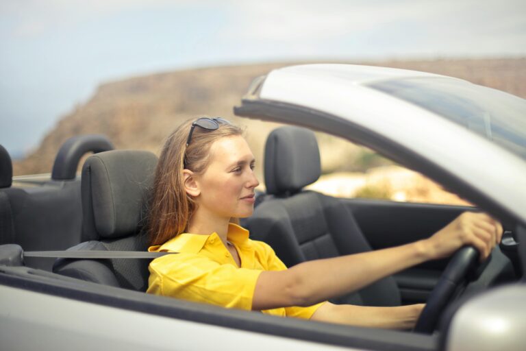 Women driving a convertible