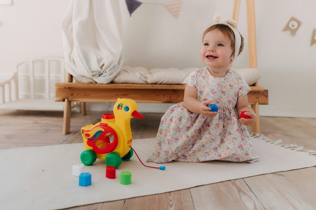 Baby Playing with Colorful Toy
