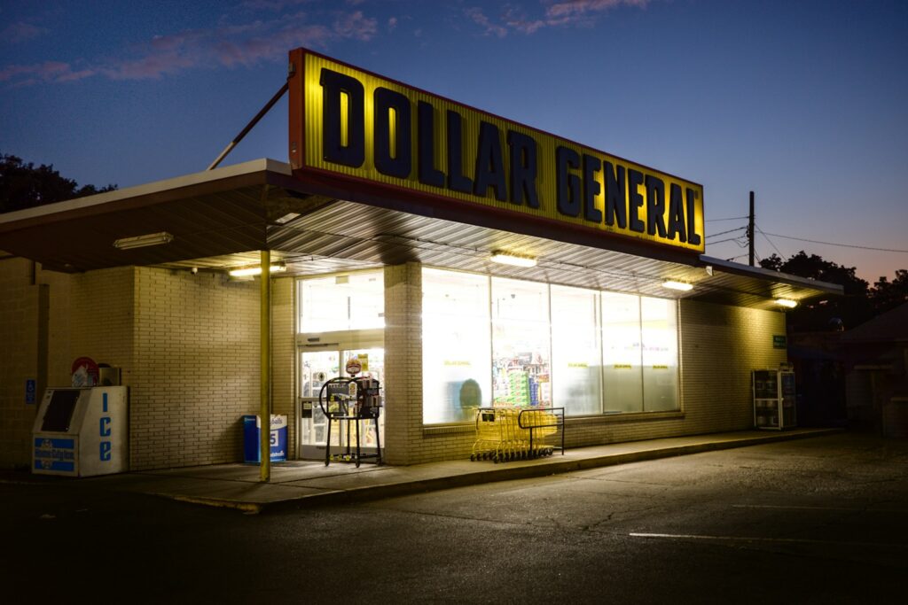 A dollar general store lit up at night