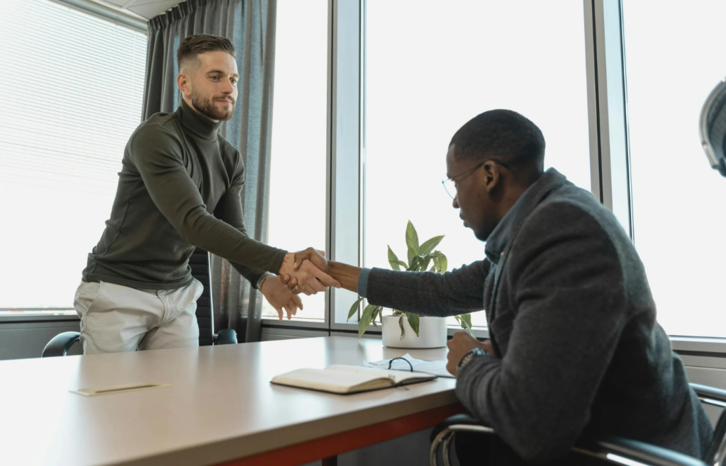 Two people are shaking hands