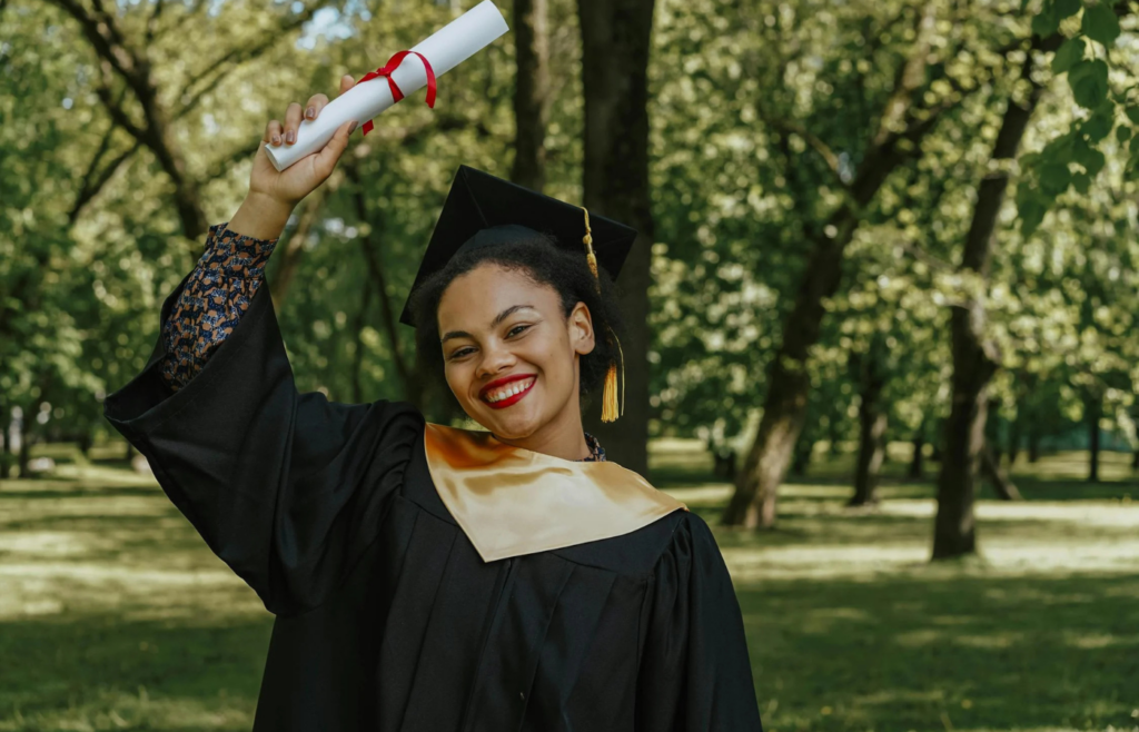 A Graduate Holding Her Diploma