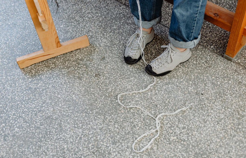 A lengthy resume scroll unraveling onto the floor