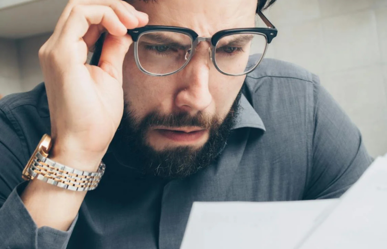 A person shocked by an unexpected bill