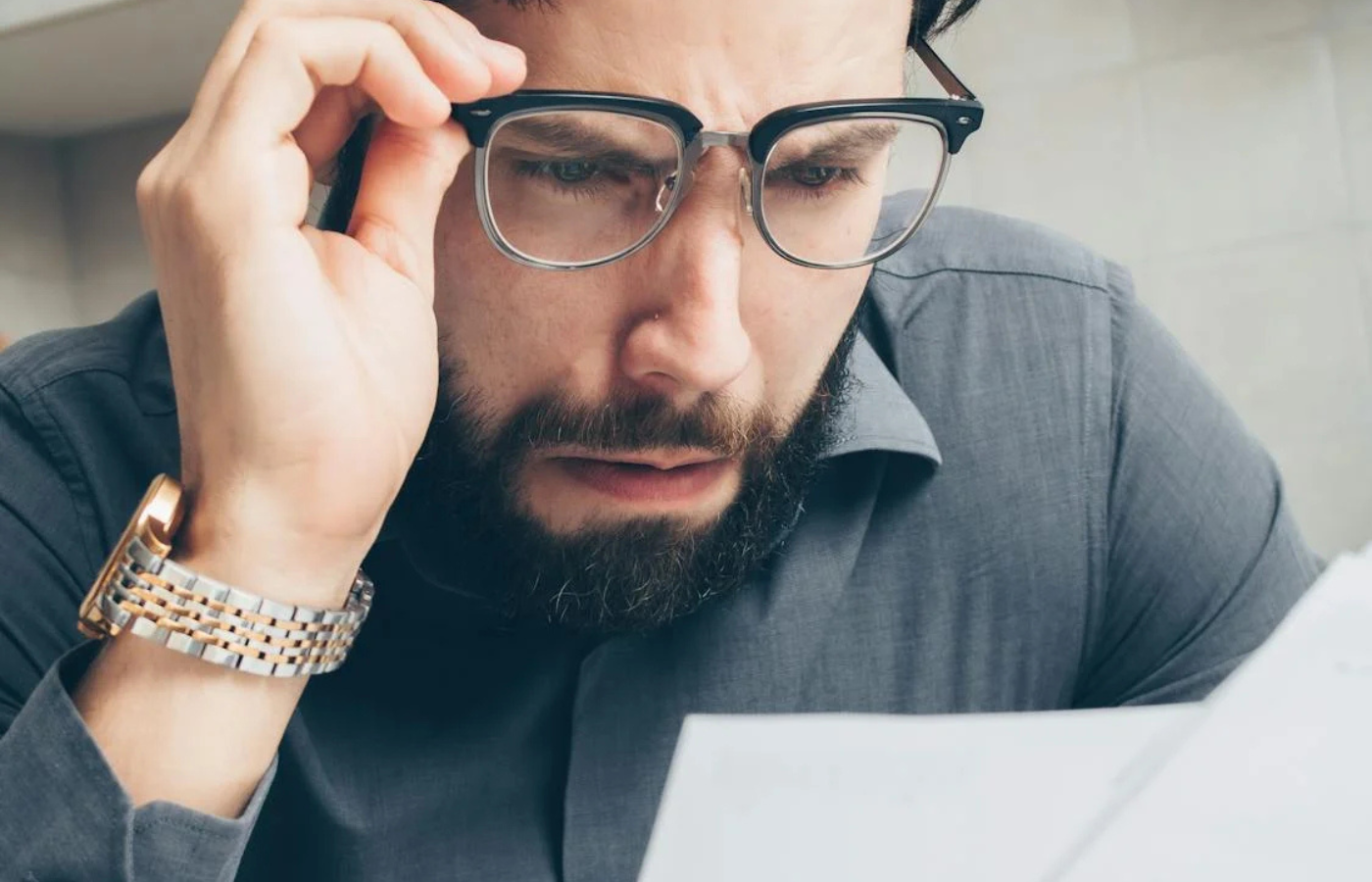 A person shocked by an unexpected bill