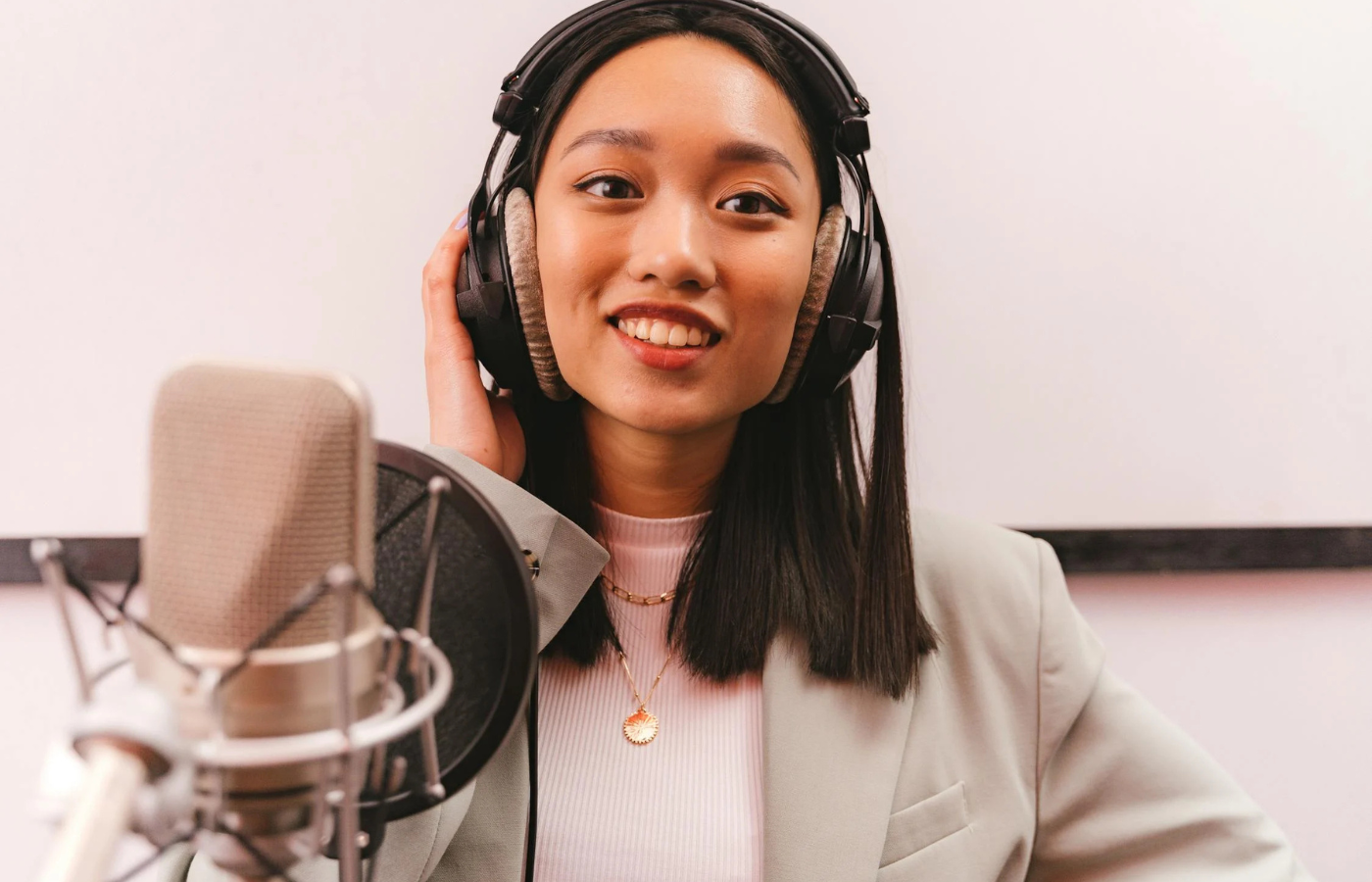 A radio host speaking into a microphone