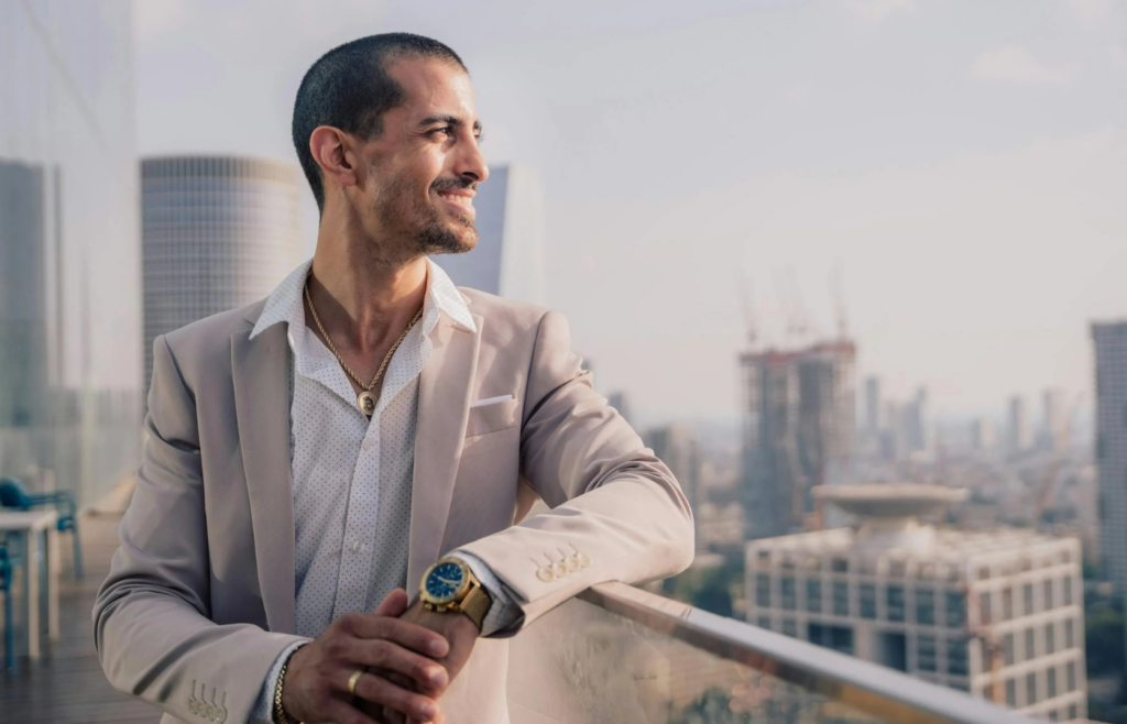 A luxury wristwatch worn by a professional in a business setting