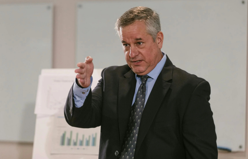 A person attending a seminar or workshop