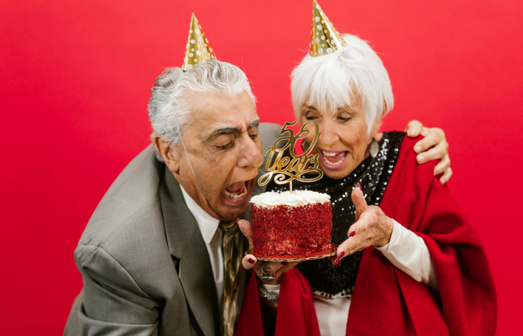 An elderly couple celebrating a milestone anniversary