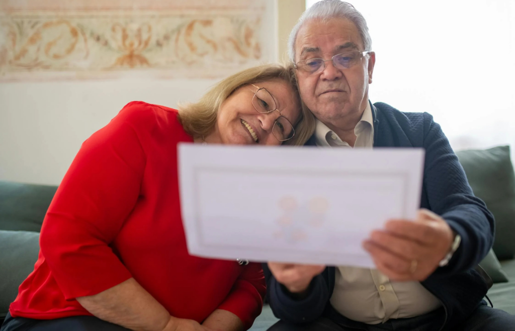 A family reviewing life insurance policies together