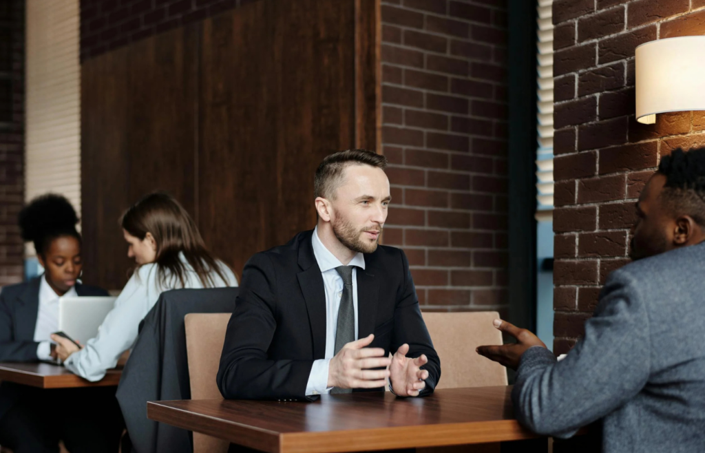 Two professionals engaged in a salary negotiation
