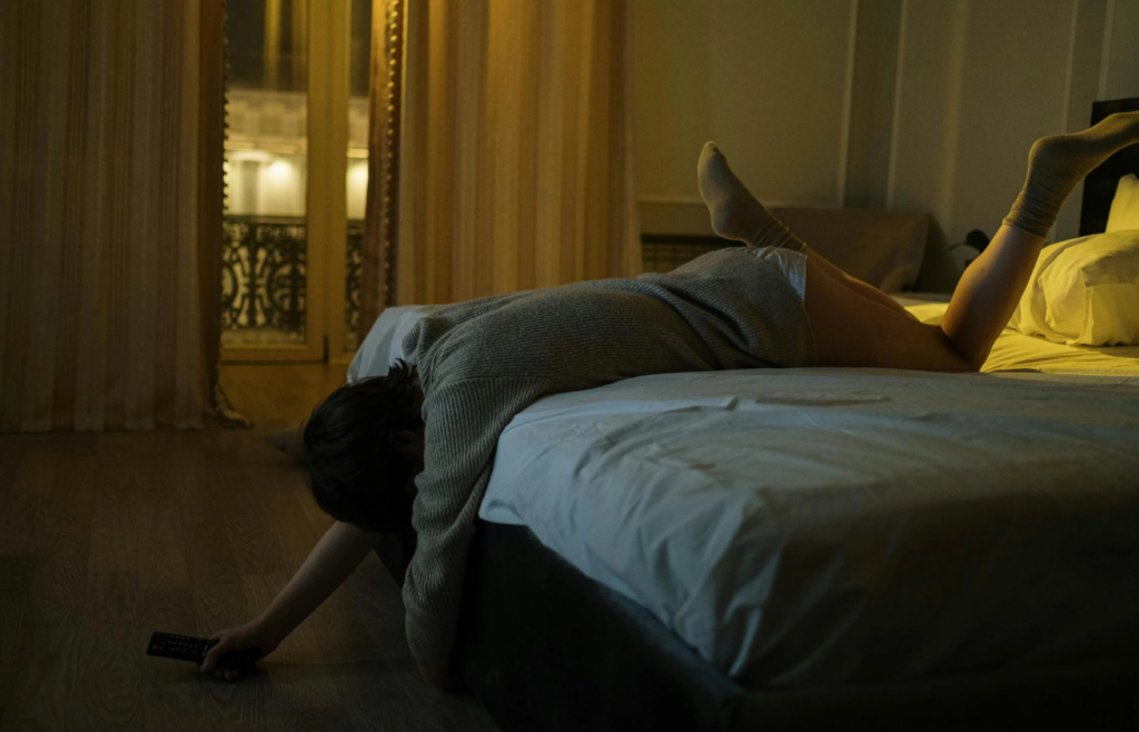 A peaceful bedroom setting with dim lighting