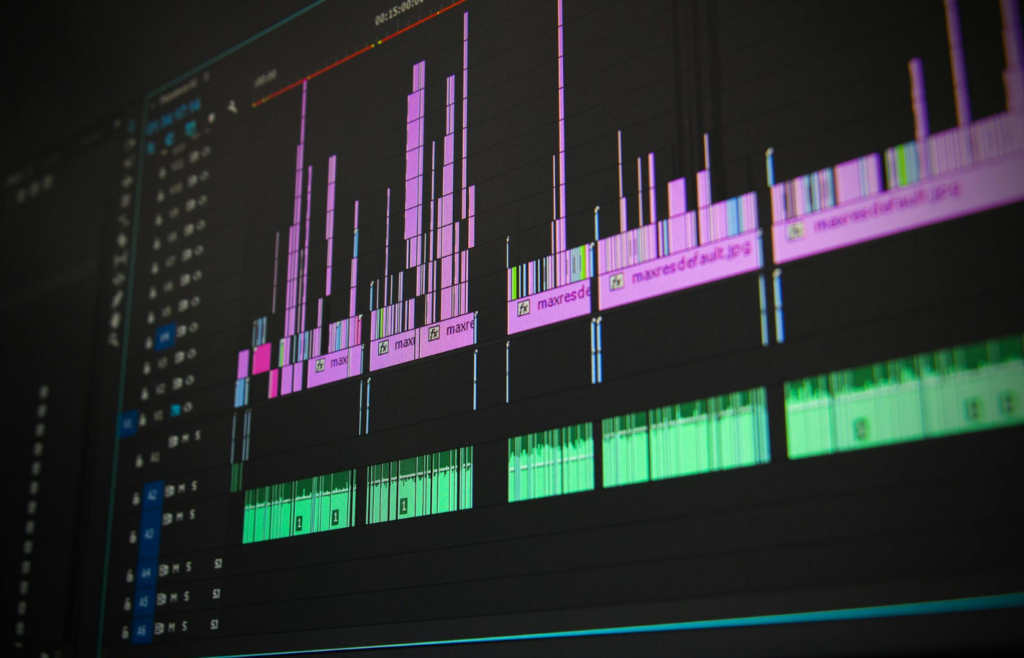 A sound engineer tweaking waveform audio