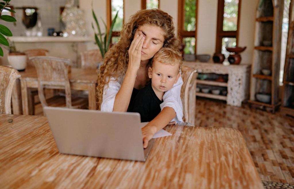 A person working from home with multiple distractions around