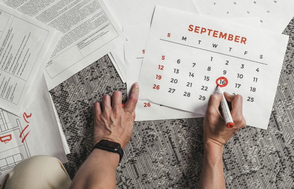 A calendar marked with 'Financial Review' left unchecked