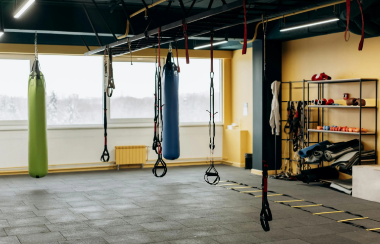 An empty gym with unused equipment