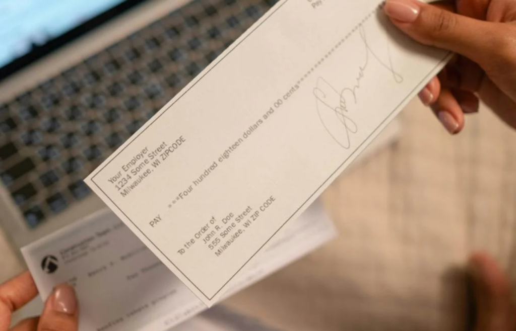 A person surprised by an unexpected charge on a bank statement