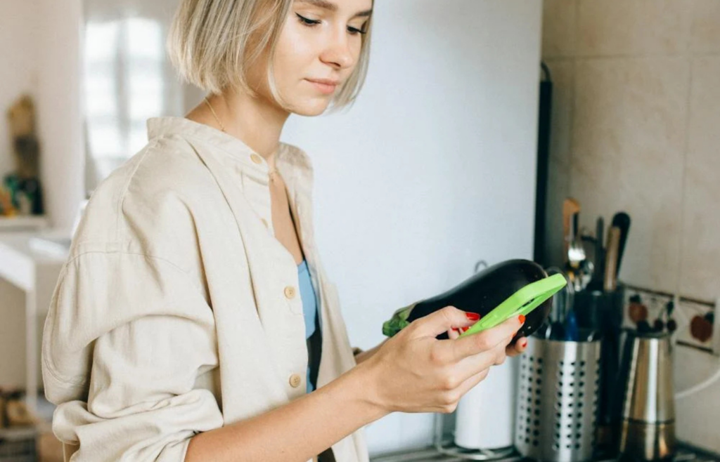  A person answering emails while cooking dinner