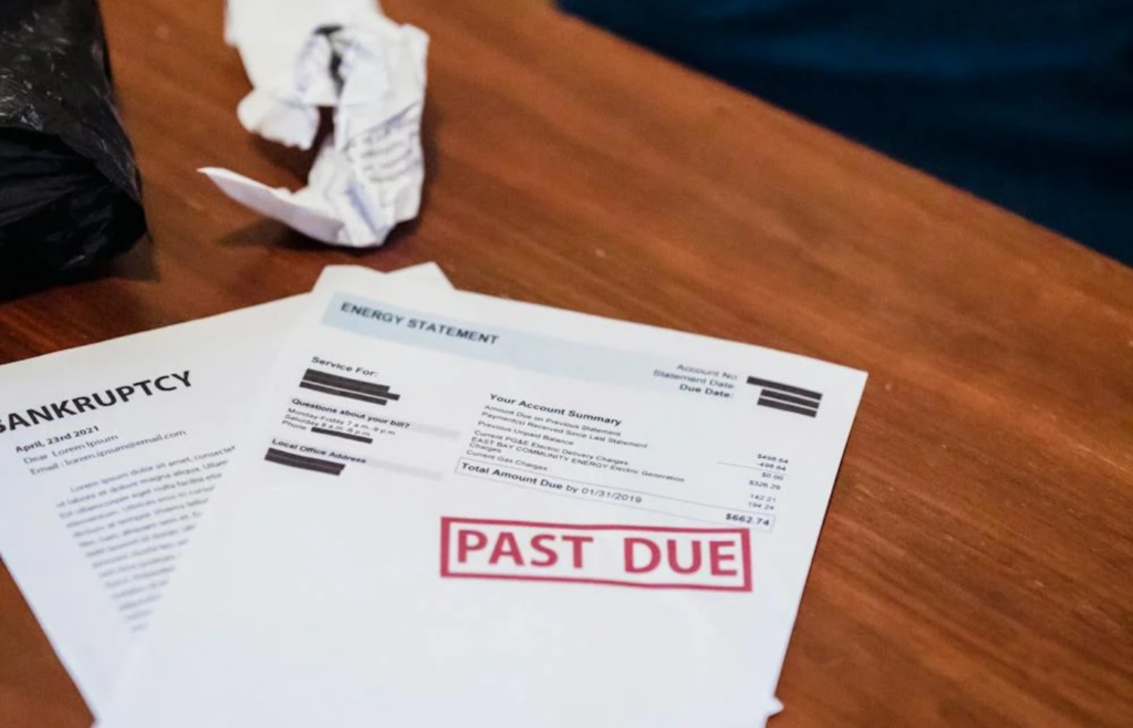Overdue bills and credit card statements piling up