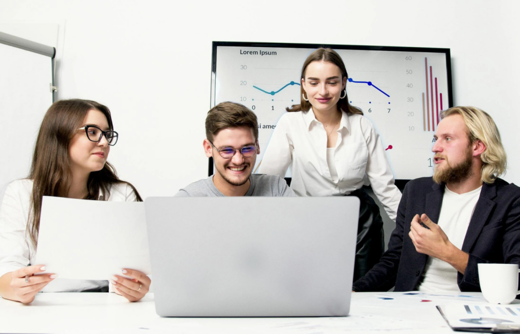 A manager closely overseeing an employee's every move
