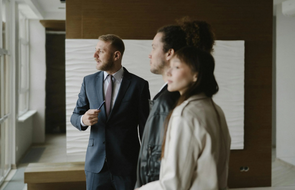 A confused team looking at a leader with a broken compass