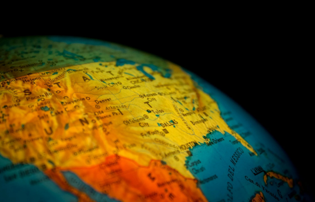 A world map with profile pictures from different countries