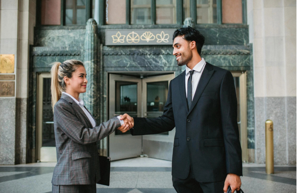 A business owner shaking hands with a fractional CFO