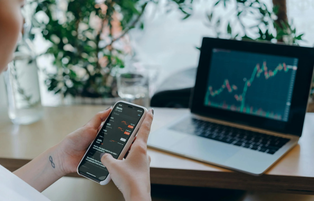 A freelancer reviewing investment options in a co-working space