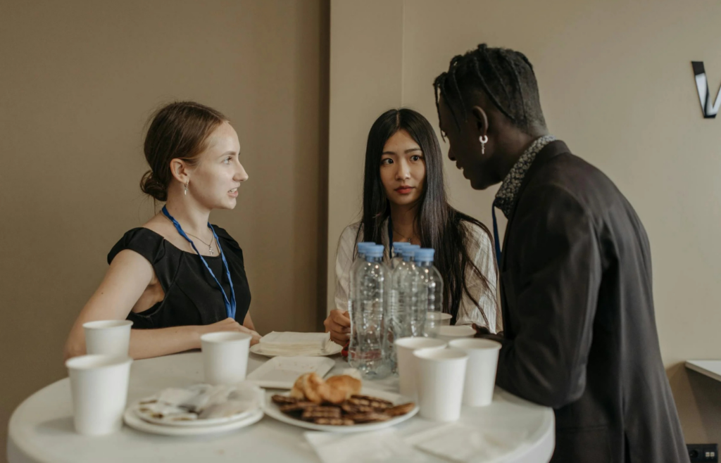 People conversing at a casual networking event