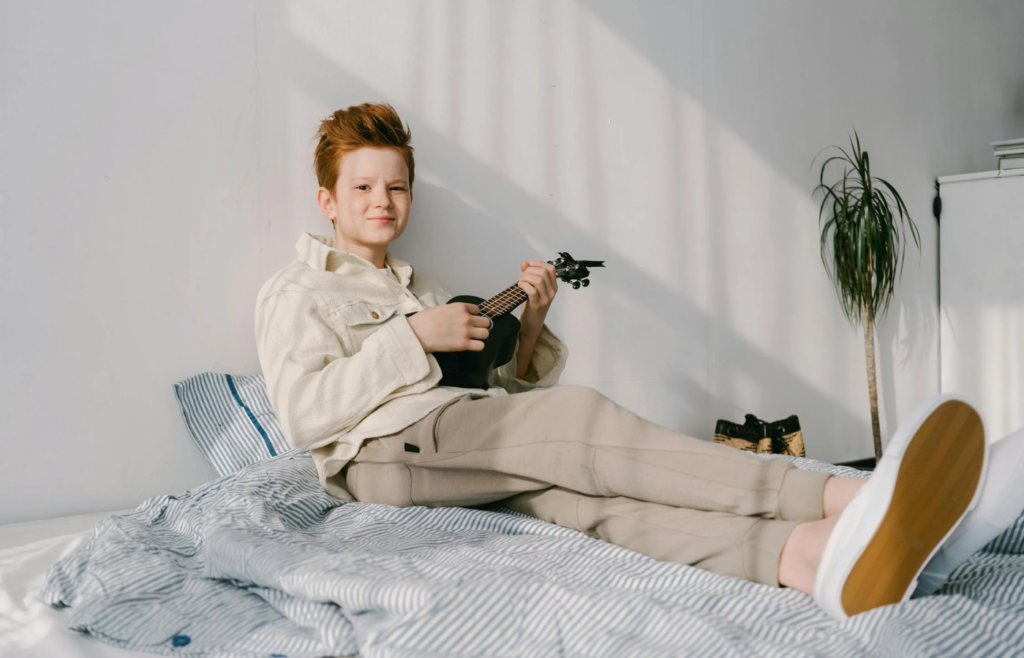 Someone playing a musical instrument at home