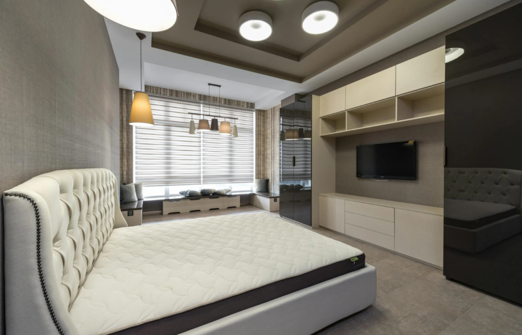 Modern, stylish light fixtures illuminating a cozy living room
