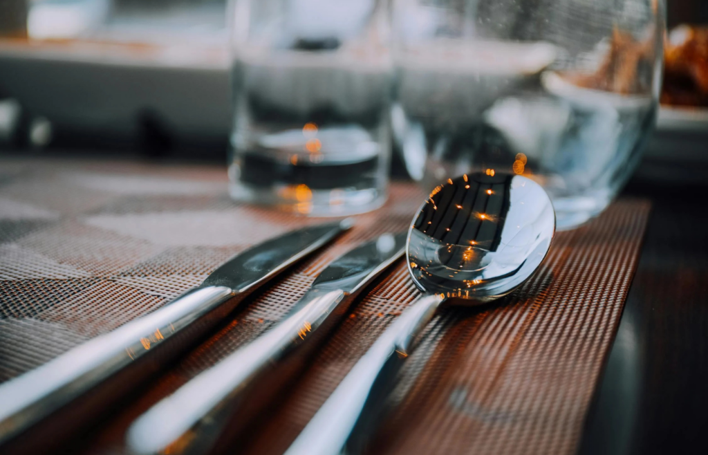 A set of premium kitchen knives and utensils neatly arranged on a countertop