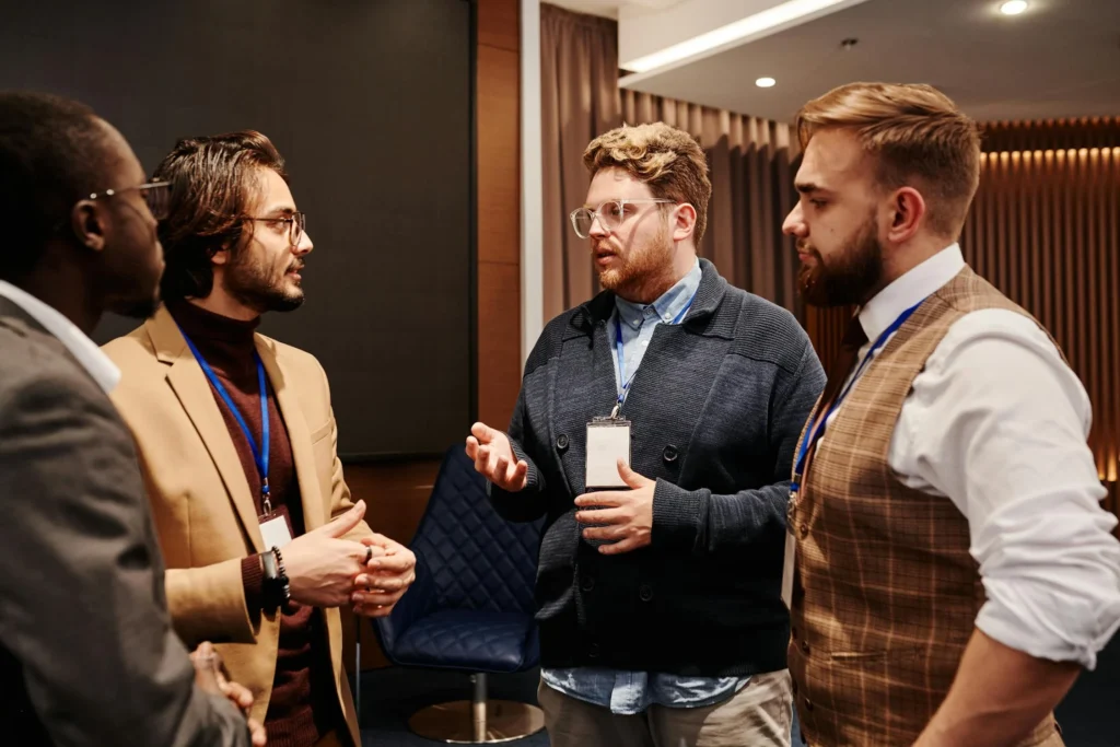 A group of professionals networking at a seminar