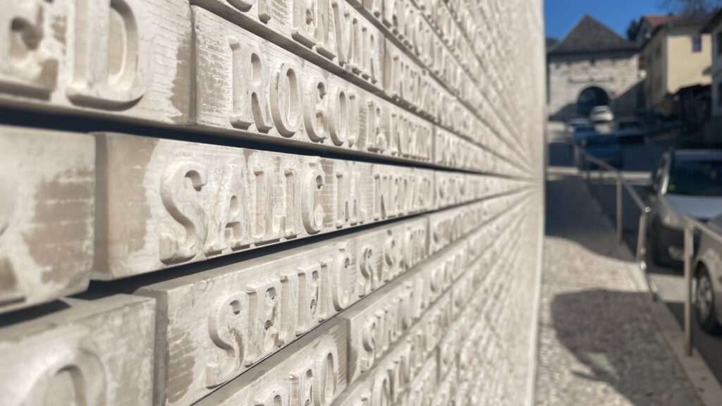 A car is parked in front of a building