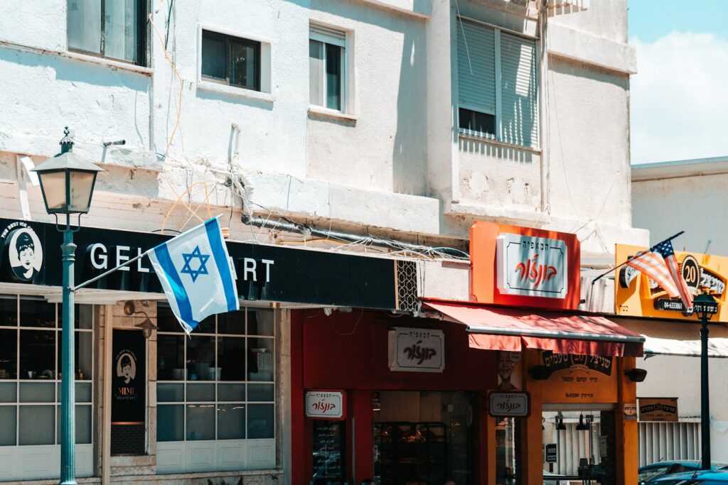 a street corner with a few shops on the corner